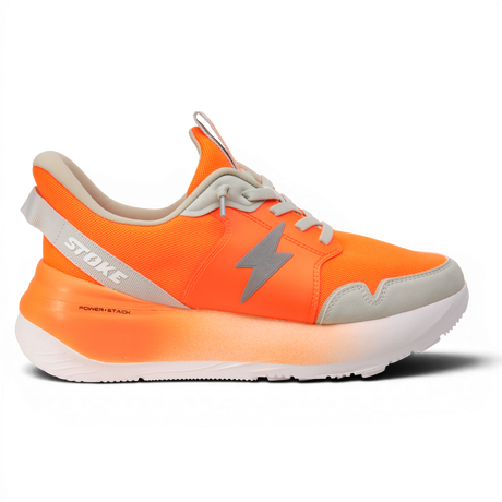Orange running shoe with gray accents on a white background