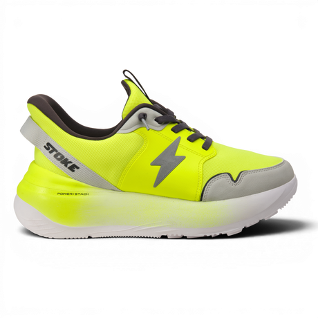Bright yellow running shoe with gray accents on a white background
