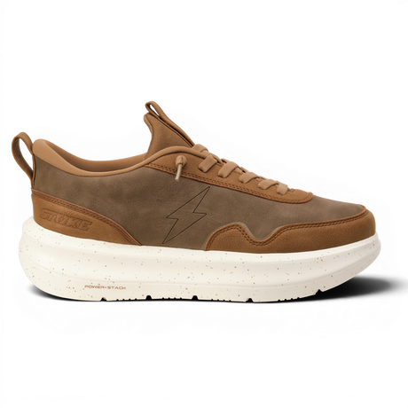 Brown sneaker with white sole on a white background