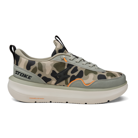 Camouflage sneaker with 'Stoke' branding on a white background